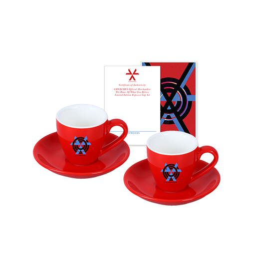 CHVRCHES official merchandise. Set of 2 red ceramic espresso cups and saucers featuring The Bones of What You Believe album art printed on one side of each cup. Set is packaged in a custom printed box.